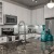 Kitchen with large white cabinets and dark stone countertops