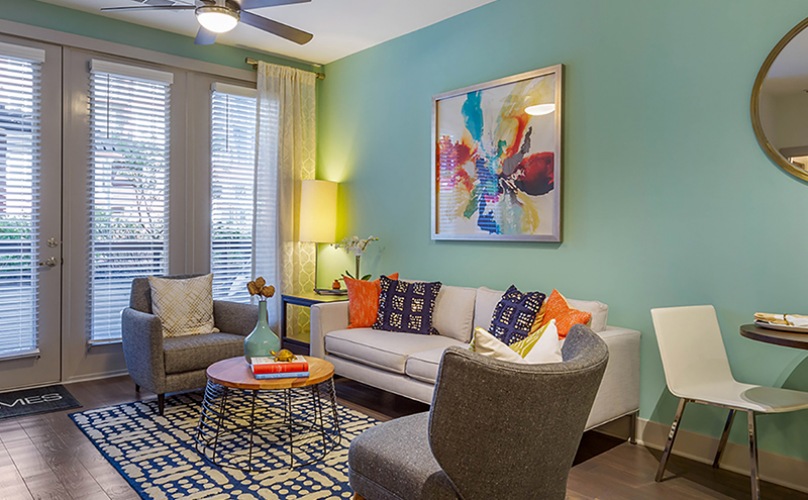 Comfy, bright living room with vibrant colors and furniture