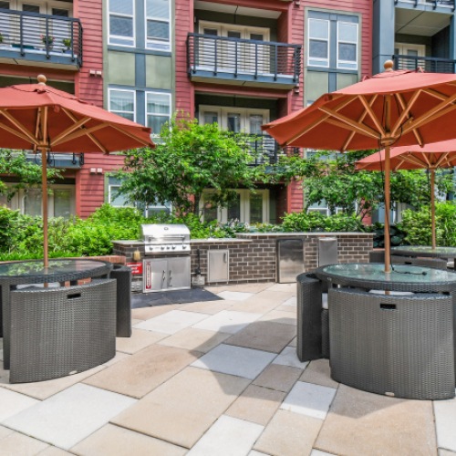 outdoor patio complete with grills and tables outdoor patio complete with grills and tables